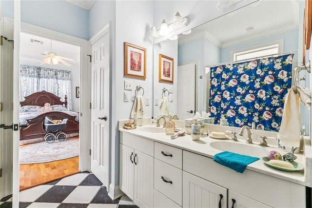 57 Beverly Garden Dr, Metairie, LA 70001 - full bathroom featuring tile patterned floors, healthy amount of natural light, double vanity, ensuite bathroom, and ornamental molding