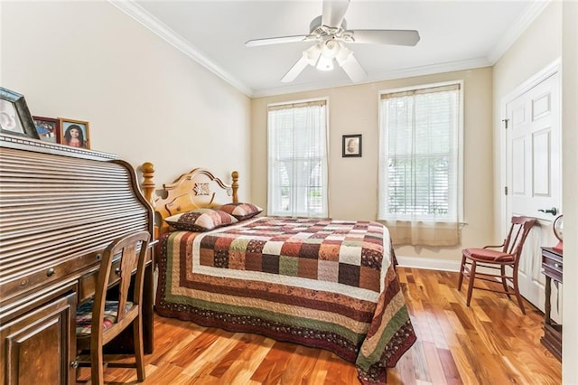 57 Beverly Garden Dr, Metairie, LA 70001 - bedroom featuring light wood-style floors, ornamental molding, and a ceiling fan