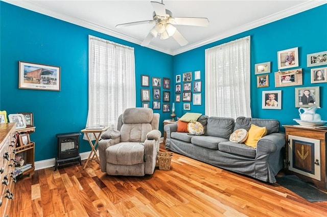 57 Beverly Garden Dr, Metairie, LA 70001 - living room featuring ceiling fan, wood finished floors, crown molding, and plenty of natural light