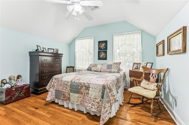 57 Beverly Garden Dr, Metairie, LA 70001 - bedroom with wood finished floors, vaulted ceiling, and ceiling fan