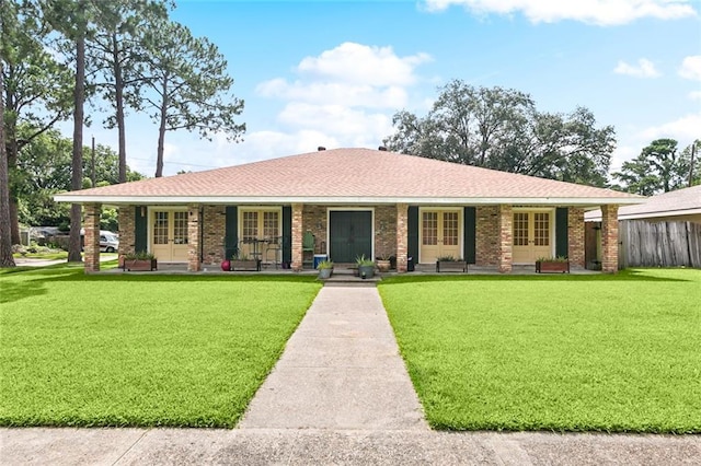 1369 Holiday Pl, New Orleans, LA 70114 - ranch-style home featuring french doors, brick siding, a porch, and roof with shingles