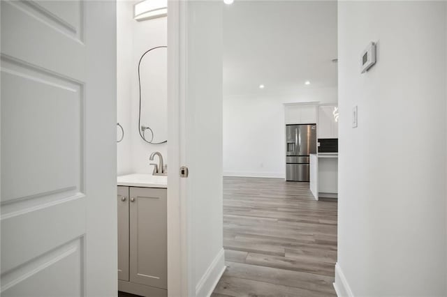 1916 Roosevelt Blvd, Kenner, LA 70062 - hallway with light wood-type flooring and recessed lighting