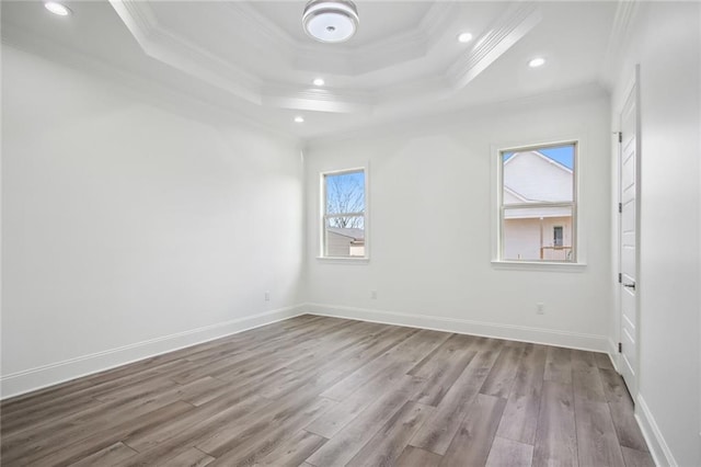 1916 Roosevelt Blvd, Kenner, LA 70062 - spare room featuring crown molding, a raised ceiling, wood finished floors, and recessed lighting