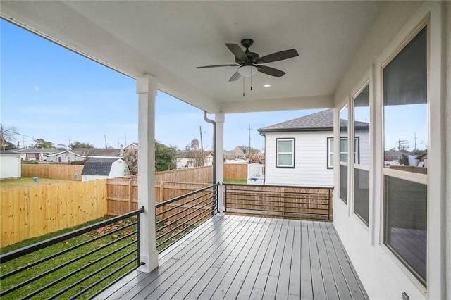 1916 Roosevelt Blvd, Kenner, LA 70062 - wooden terrace featuring a ceiling fan, a fenced backyard, and a residential view
