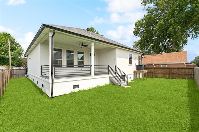 1916 Roosevelt Blvd, Kenner, LA 70062 - rear view of house featuring crawl space, a fenced backyard, stucco siding, and ceiling fan