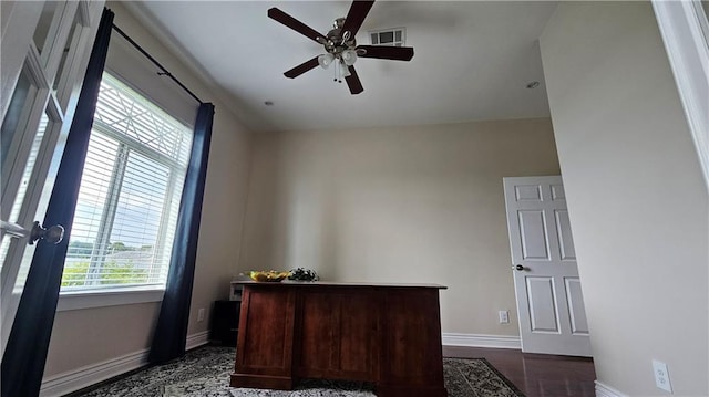 181 Latigue Rd, Avondale, LA 70094 - home office with a ceiling fan and dark wood-type flooring
