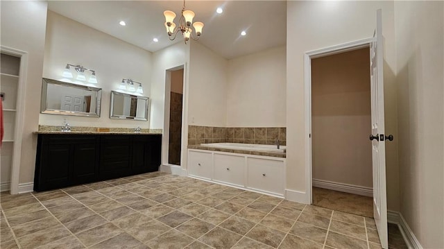 181 Latigue Rd, Avondale, LA 70094 - bathroom featuring a chandelier, a garden tub, double vanity, recessed lighting, and tile patterned flooring