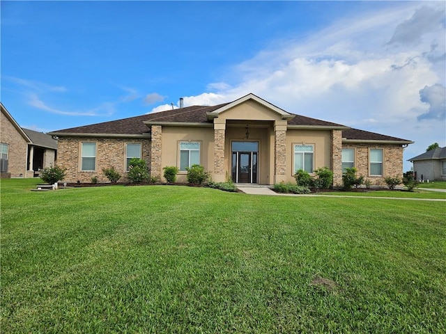 181 Latigue Rd, Avondale, LA 70094 - view of front facade with a front lawn, roof with shingles, brick siding, and stucco siding