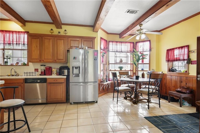 60222 N Bell Rd, Amite, LA 70422 - kitchen featuring stainless steel appliances, tile countertops, beam ceiling, a ceiling fan, and light tile patterned flooring
