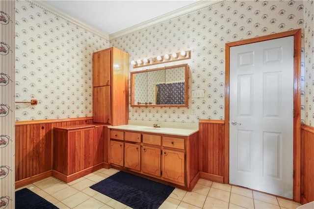 60222 N Bell Rd, Amite, LA 70422 - bathroom featuring wallpapered walls, a wainscoted wall, vanity, tile patterned floors, and crown molding