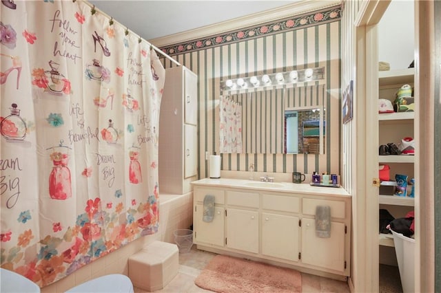 60222 N Bell Rd, Amite, LA 70422 - bathroom featuring shower / bath combo with shower curtain, vanity, wallpapered walls, and tile patterned flooring