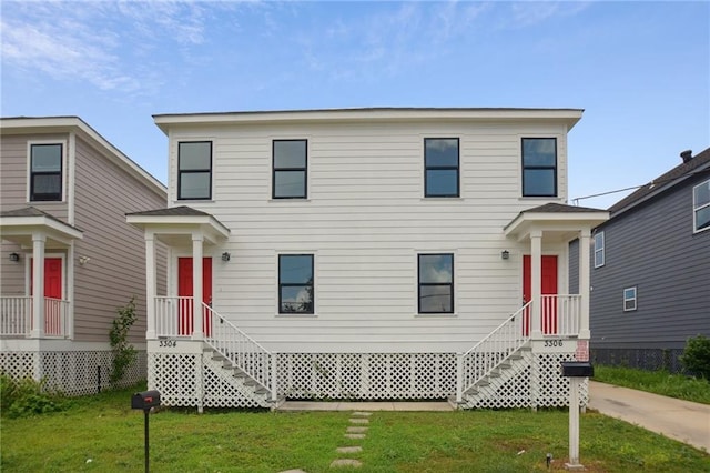 3304 Metropolitan St, New Orleans, LA 70126 - view of front of home featuring a front lawn