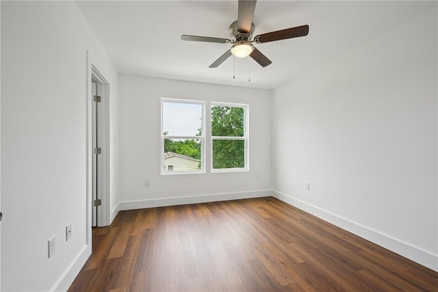 3304 Metropolitan St, New Orleans, LA 70126 - empty room featuring dark wood-style floors and a ceiling fan