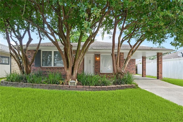 3809 N Woodlawn Ave, Metairie, LA 70006 - single story home with brick siding and concrete driveway