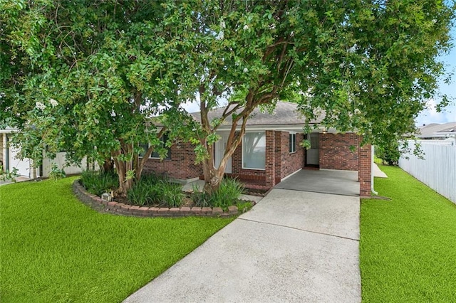 3809 N Woodlawn Ave, Metairie, LA 70006 - view of front of property featuring brick siding and concrete driveway