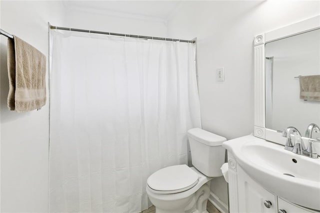 3809 N Woodlawn Ave, Metairie, LA 70006 - bathroom featuring crown molding, vanity, and curtained shower