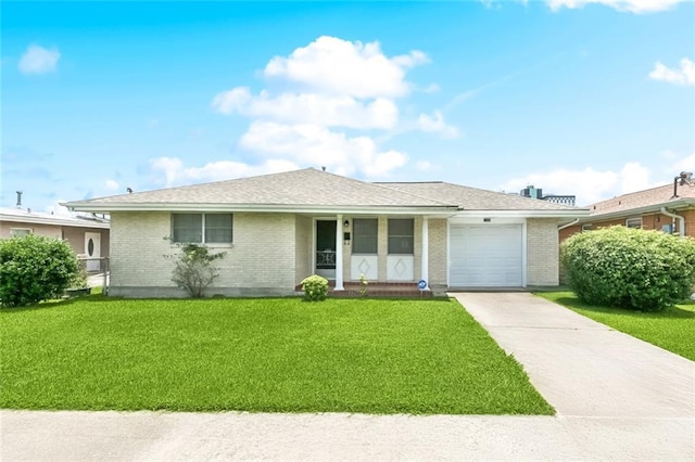 2209 Athania Pkwy, Metairie, LA 70001 - ranch-style home featuring an attached garage, brick siding, and a front yard