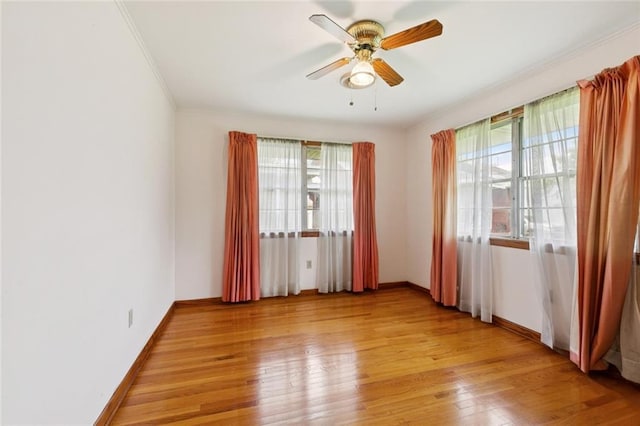 2209 Athania Pkwy, Metairie, LA 70001 - unfurnished room with light wood-style flooring, ornamental molding, and a ceiling fan