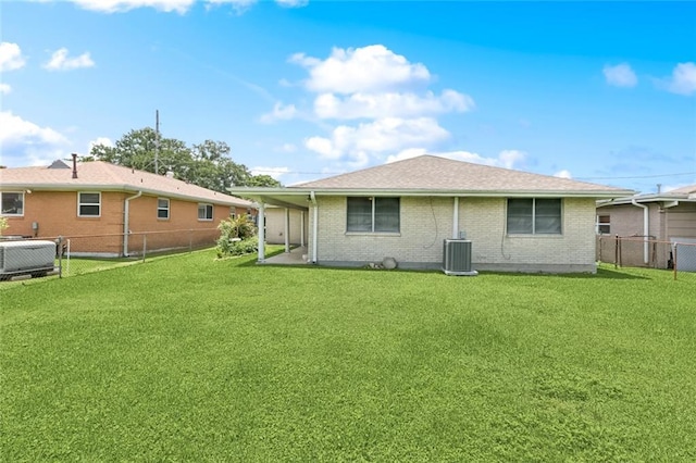 2209 Athania Pkwy, Metairie, LA 70001 - back of property with a fenced backyard and brick siding