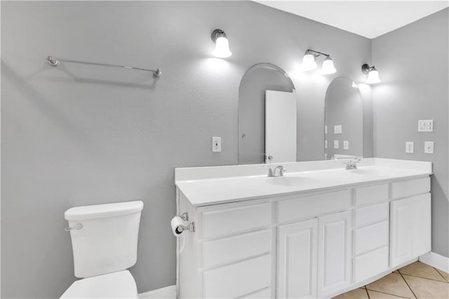 bathroom featuring double vanity and tile patterned floors