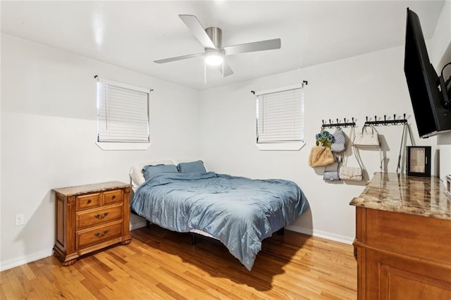 243 Carr Dr, Slidell, LA 70458 - bedroom featuring light wood-type flooring and a ceiling fan