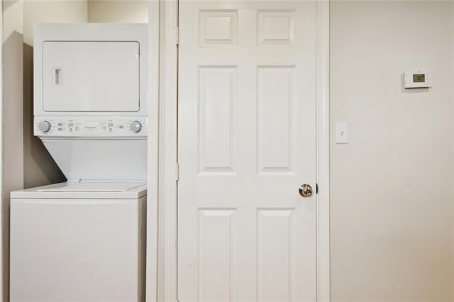 243 Carr Dr, Slidell, LA 70458 - laundry area featuring stacked washer / dryer