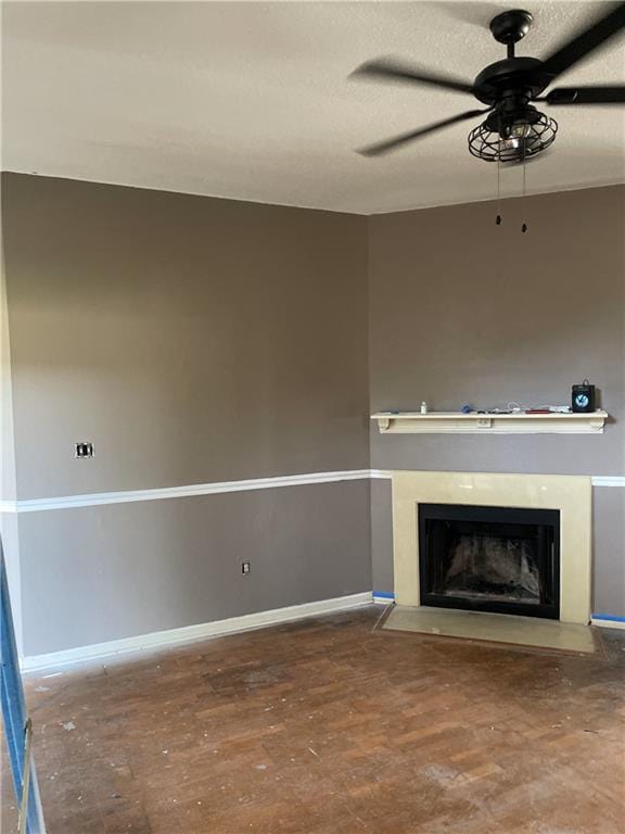 5531 New England Dr, New Orleans, LA 70129 - unfurnished living room featuring ceiling fan and a fireplace with flush hearth