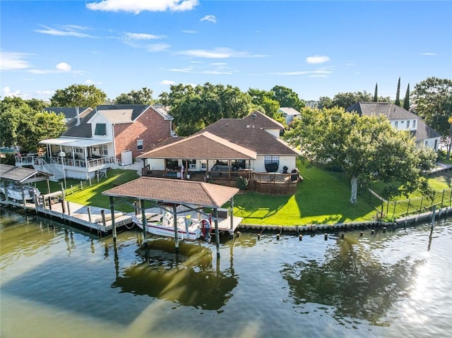 212 Ranger Pl, Slidell, LA 70458 - dock with boat lift, a water view, and a lawn