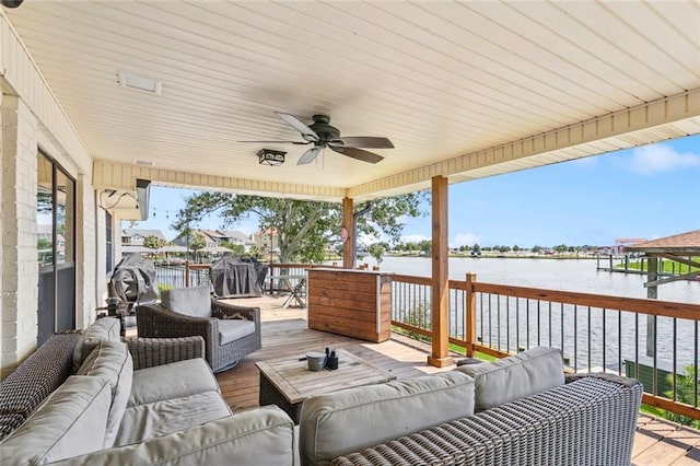 212 Ranger Pl, Slidell, LA 70458 - wooden deck featuring outdoor lounge area, a water view, ceiling fan, and a boat dock