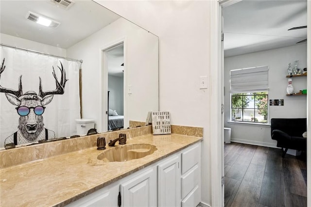 212 Ranger Pl, Slidell, LA 70458 - full bathroom featuring vanity, hardwood / wood-style flooring, ensuite bathroom, and a shower with curtain