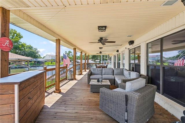 212 Ranger Pl, Slidell, LA 70458 - deck with ceiling fan and an outdoor hangout area
