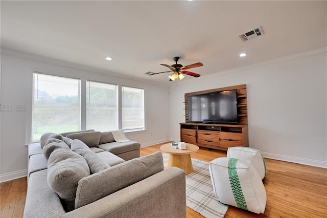 4043 S Inwood Ave, New Orleans, LA 70131 - living area featuring crown molding, light wood finished floors, a ceiling fan, and recessed lighting