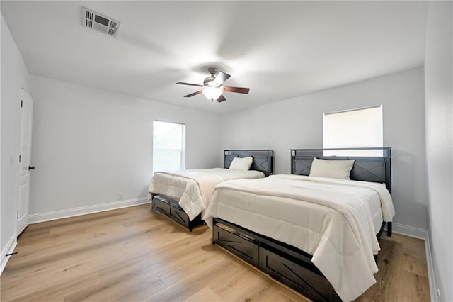 4043 S Inwood Ave, New Orleans, LA 70131 - bedroom with light wood-style floors and ceiling fan