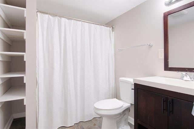 112224 N Johnson St, New Orleans, LA 70116 - bathroom with toilet and vanity