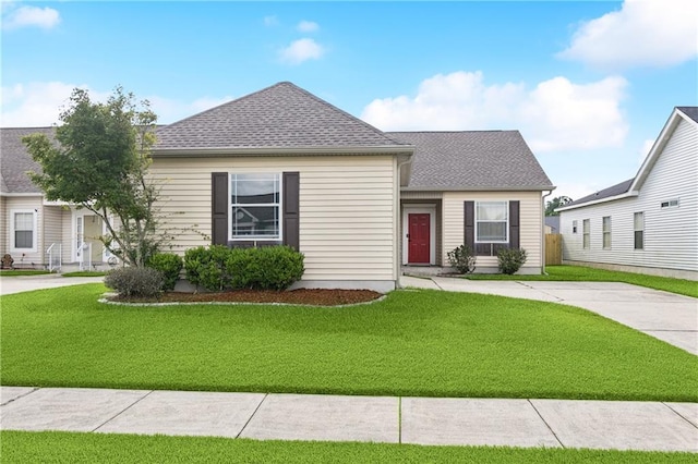 5233 Savannah Ln, Marrero, LA 70072 - view of front of house featuring a front yard and a shingled roof