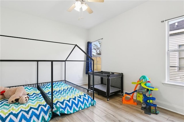 5233 Savannah Ln, Marrero, LA 70072 - bedroom featuring wood finished floors and ceiling fan