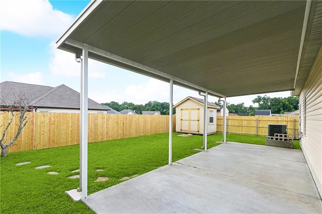 5233 Savannah Ln, Marrero, LA 70072 - fenced backyard with a patio area and a shed
