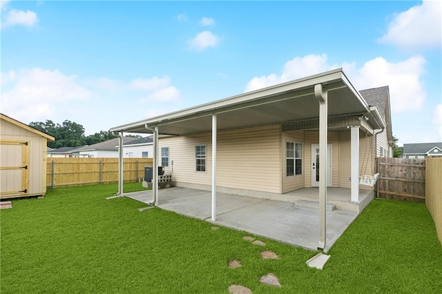 5233 Savannah Ln, Marrero, LA 70072 - rear view of property featuring a patio, a shed, and a fenced backyard