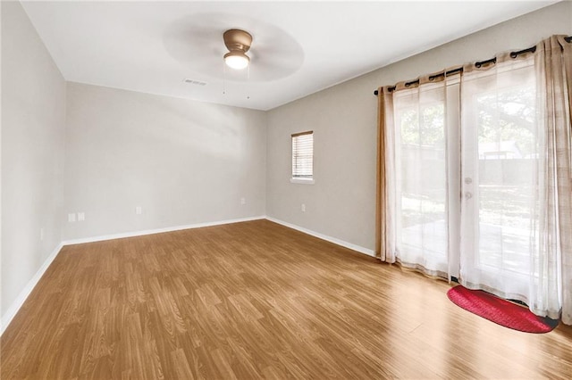 210 Westminster Dr, Slidell, LA 70460 - spare room with wood finished floors and ceiling fan