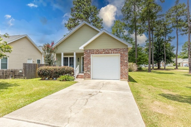 416 Juliette Ln, Mandeville, LA 70448 - view of front of house with brick siding, an attached garage, a porch, and concrete driveway