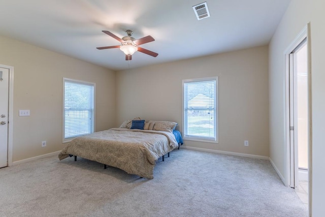 416 Juliette Ln, Mandeville, LA 70448 - bedroom featuring light colored carpet and a ceiling fan
