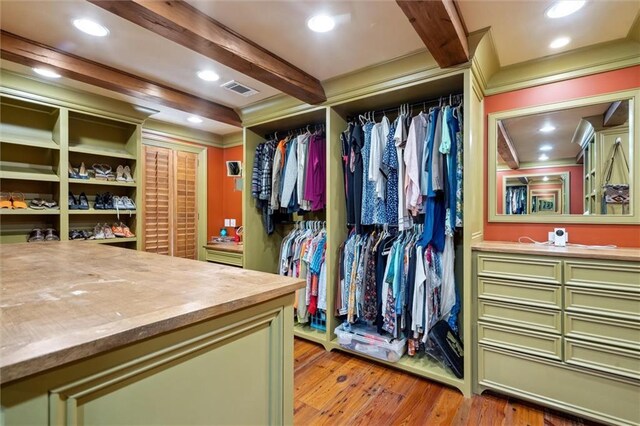 266 Wpa Rd, Ms, MS 39459 - spacious closet with light wood-style floors and beam ceiling