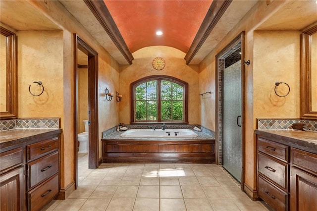 266 Wpa Rd, Ms, MS 39459 - full bath with a bath, lofted ceiling, decorative backsplash, vanity, and a shower stall