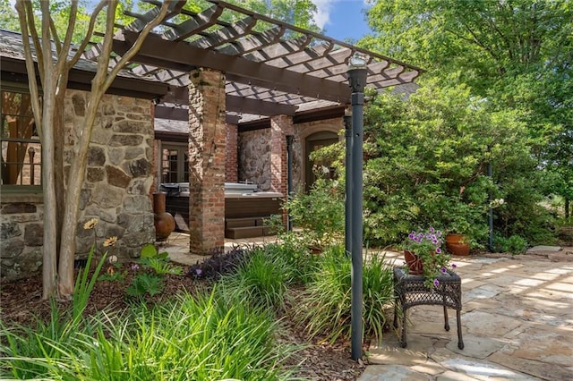 266 Wpa Rd, Ms, MS 39459 - view of patio featuring a hot tub and a pergola