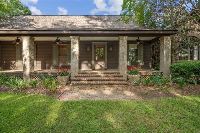 266 Wpa Rd, Ms, MS 39459 - entrance to property featuring ceiling fan, covered porch, and a yard