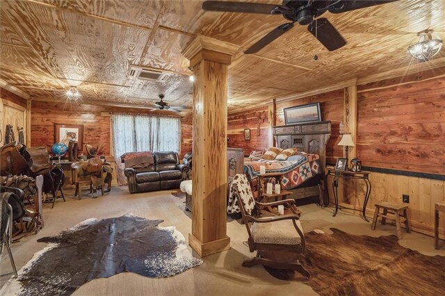 266 Wpa Rd, Ms, MS 39459 - bedroom featuring wood walls, wooden ceiling, concrete flooring, and ornate columns