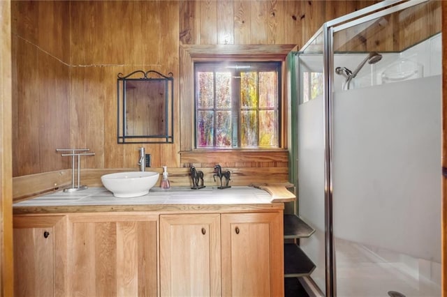 266 Wpa Rd, Ms, MS 39459 - bathroom featuring a stall shower, vanity, and wood walls