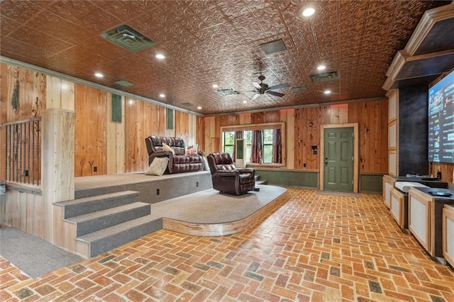 266 Wpa Rd, Ms, MS 39459 - cinema with wooden walls, brick flooring, ceiling fan, ornamental molding, and an ornate ceiling