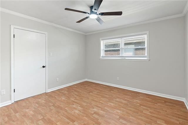 1139 Nursery Ave, Metairie, LA 70005 - unfurnished room with light wood-style flooring, a ceiling fan, and ornamental molding