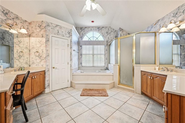 104 Inlet Dr, Slidell, LA 70458 - bathroom with wallpapered walls, lofted ceiling, a shower stall, a bath, and two vanities
